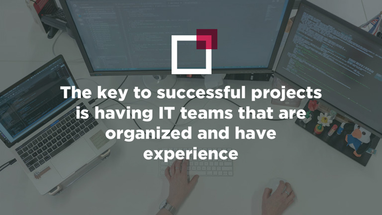 a happy software engineer with tshirt with text on well composed medical software development team